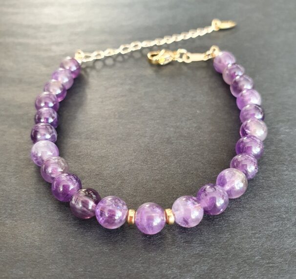 Polished amethyst crystal bracelet – gemstone jewellery for emotional healing, relaxation, and clarity.