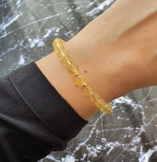 Citrine bracelet worn on wrist – November birthstone jewellery for joy, abundance, and radiant energy.
